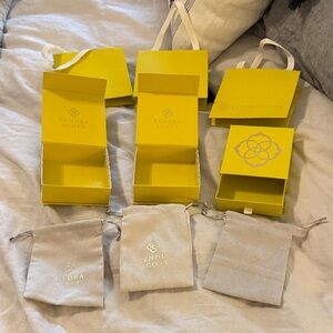 Kendra Scott Yellow Boxes and Gray Pouches